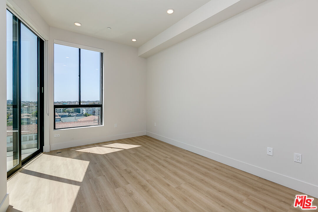 3833 Dunn Drive, Unit PH2 Culver City, CA 90232 - Photo 7 of 19 a view of an empty room with a window