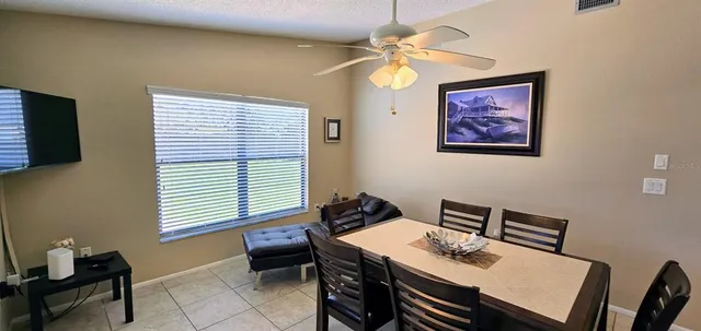 a workspace with furniture and window