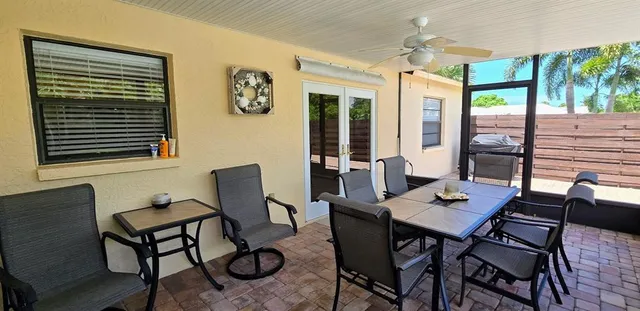 a view of a livingroom with furniture and window