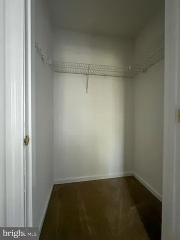 a view of a house with backyard and garden