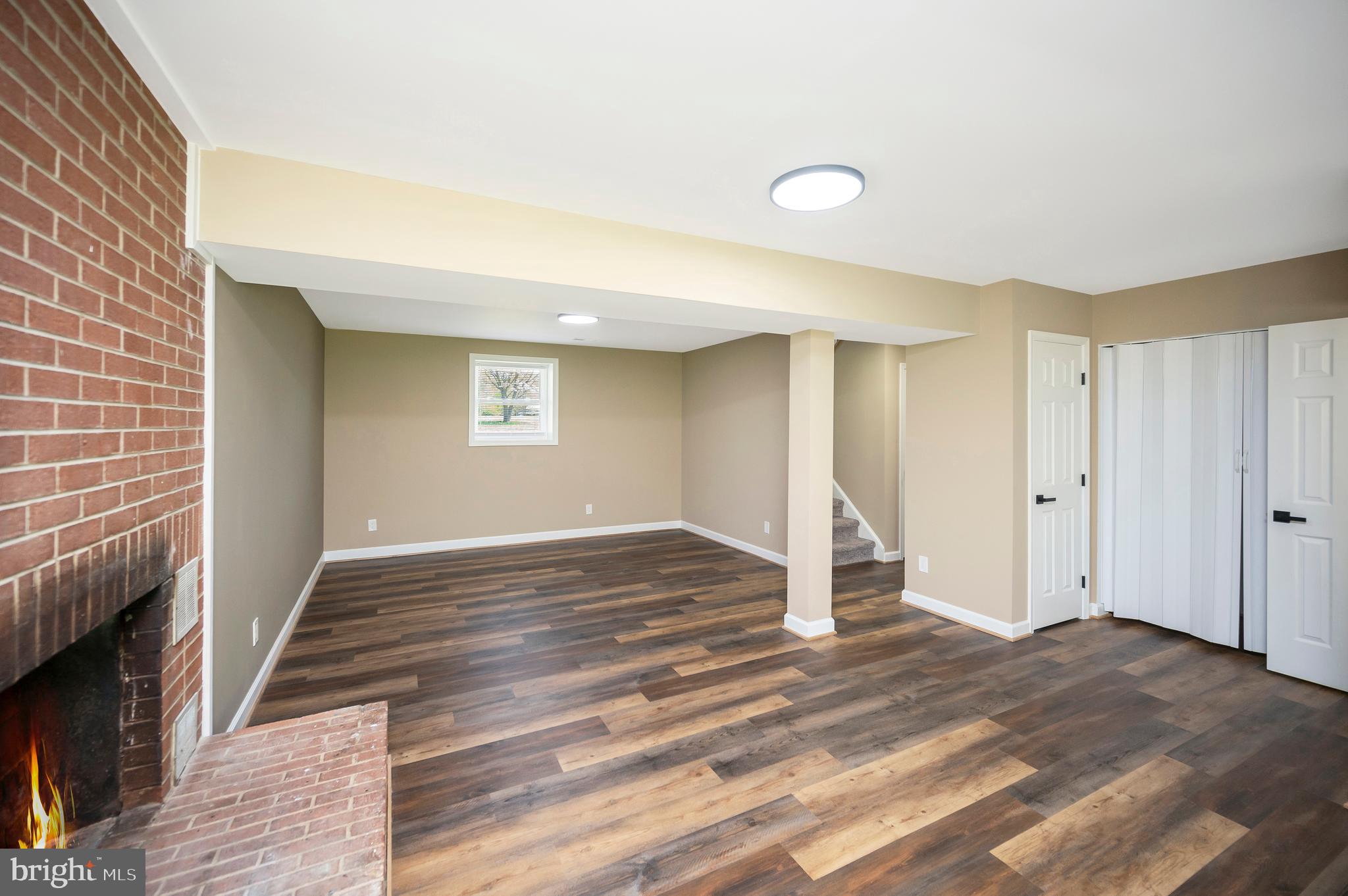 13452 Post Oak Road Spotsylvania, VA 22551 - Photo 43 of 56 a view of empty room with wooden floor and window