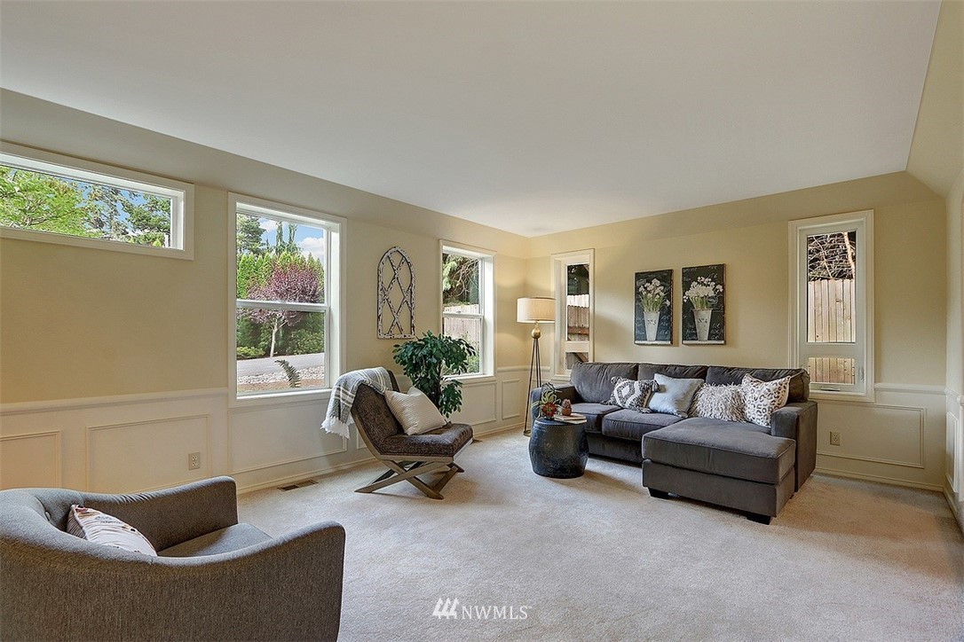 220 174th Street Southwest Bothell, WA 98012 - Photo 13 of 35 a living room with furniture and a window