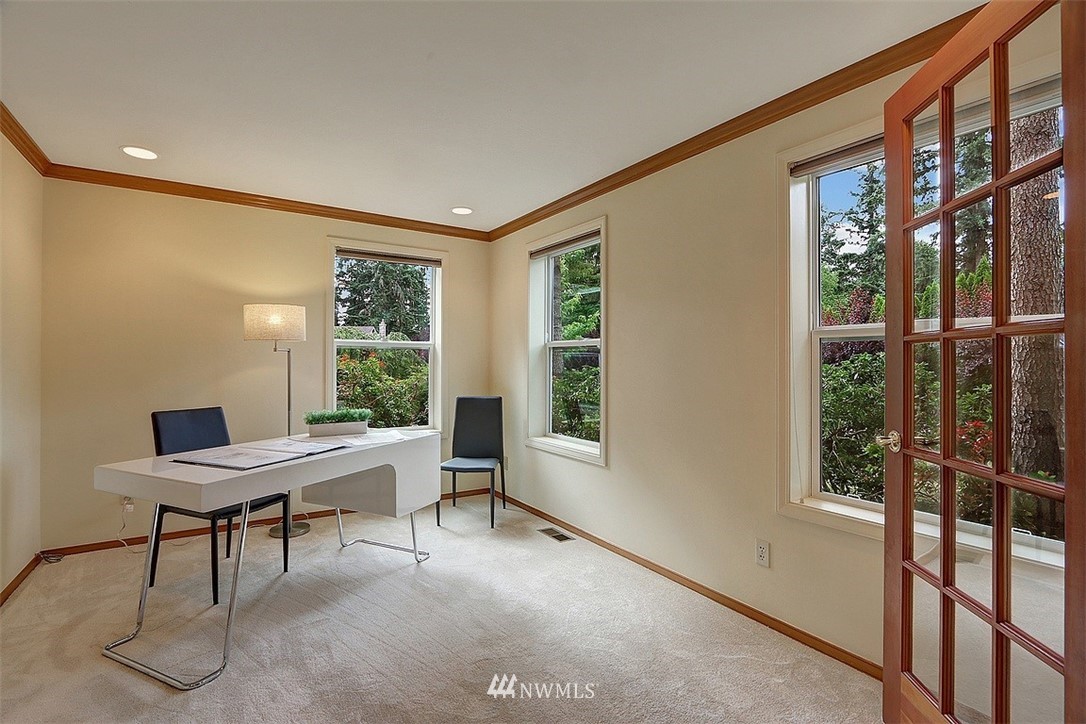 220 174th Street Southwest Bothell, WA 98012 - Photo 14 of 35 a view of a workspace with furniture and a window