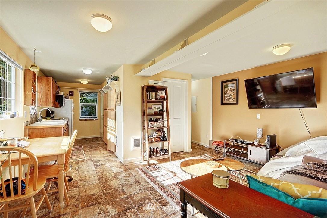 220 174th Street Southwest Bothell, WA 98012 - Photo 27 of 35 a living room with furniture and a flat screen tv