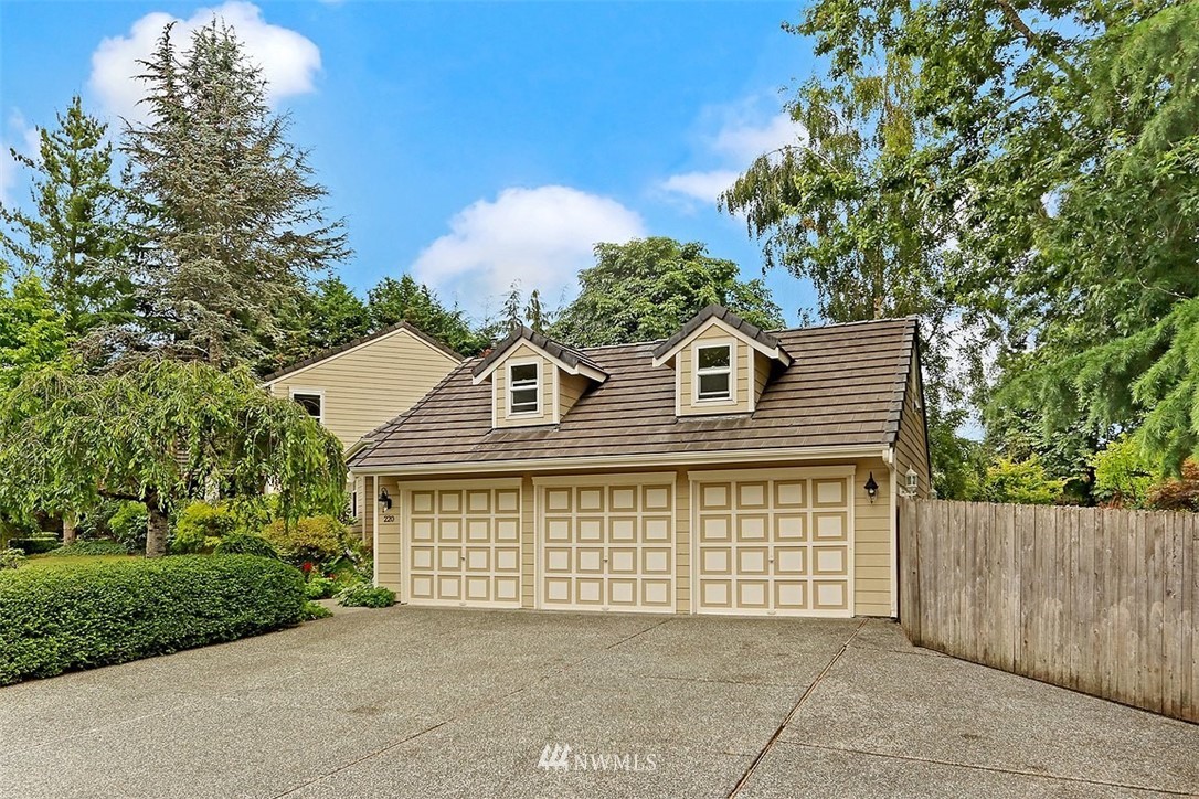 220 174th Street Southwest Bothell, WA 98012 - Photo 33 of 35 a front view of a house with a garden