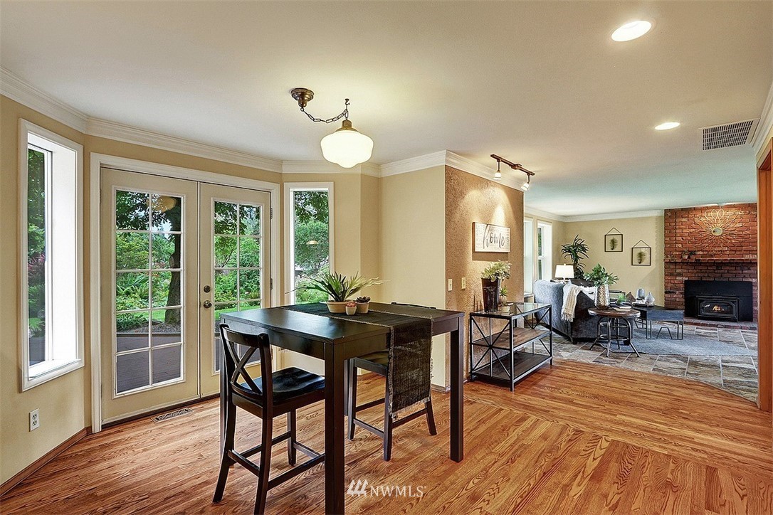 220 174th Street Southwest Bothell, WA 98012 - Photo 6 of 35 a view of a dining room with furniture window and wooden floor