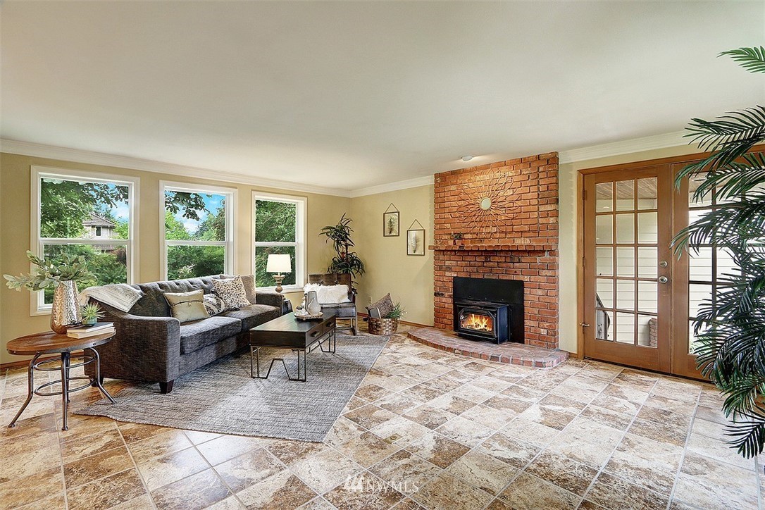 220 174th Street Southwest Bothell, WA 98012 - Photo 7 of 35 a living room with furniture large window and fireplace