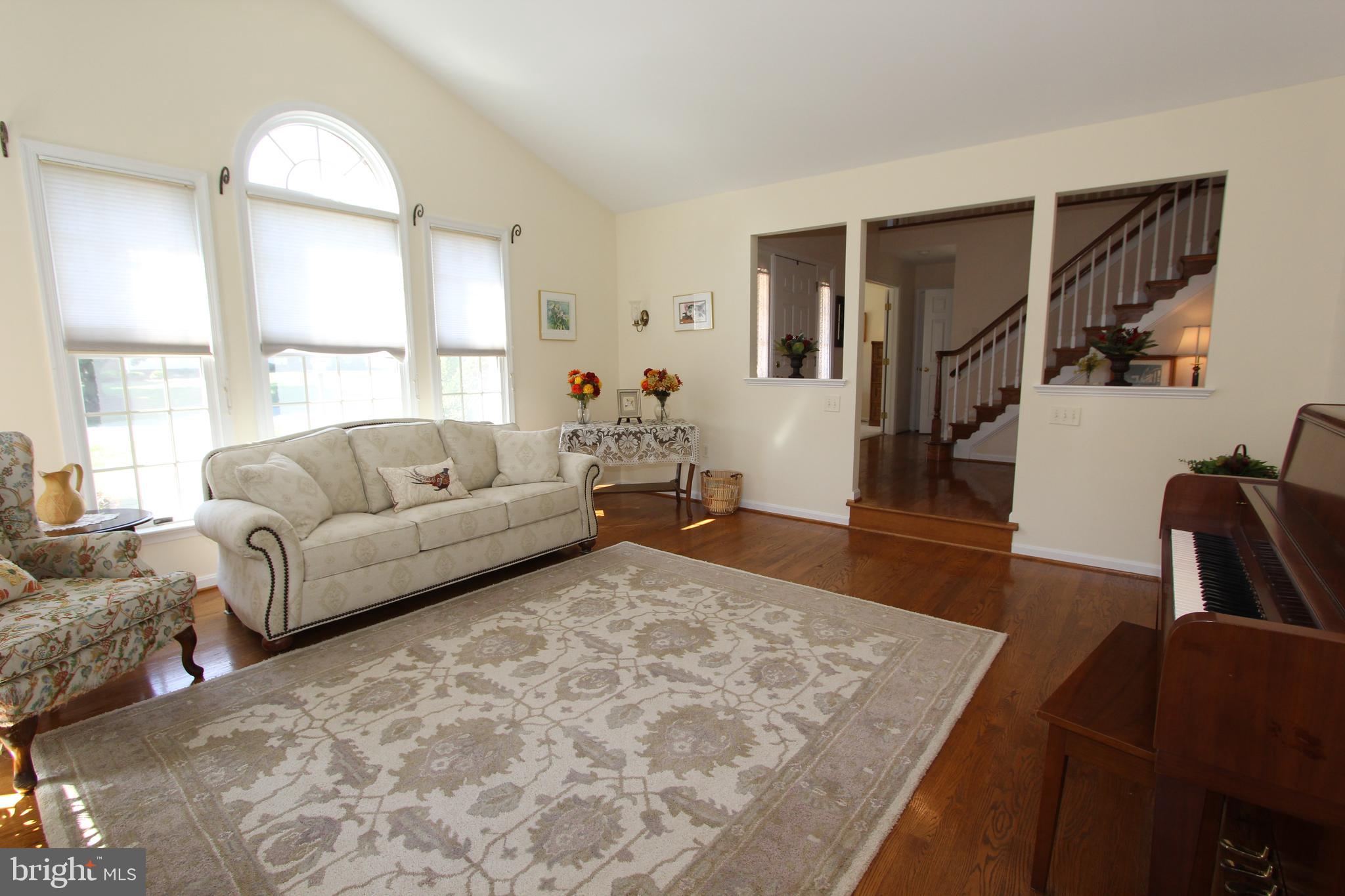 6670 Springhill Drive Frederick, MD 21702 - Photo 31 of 98 Living room view towards the foyer