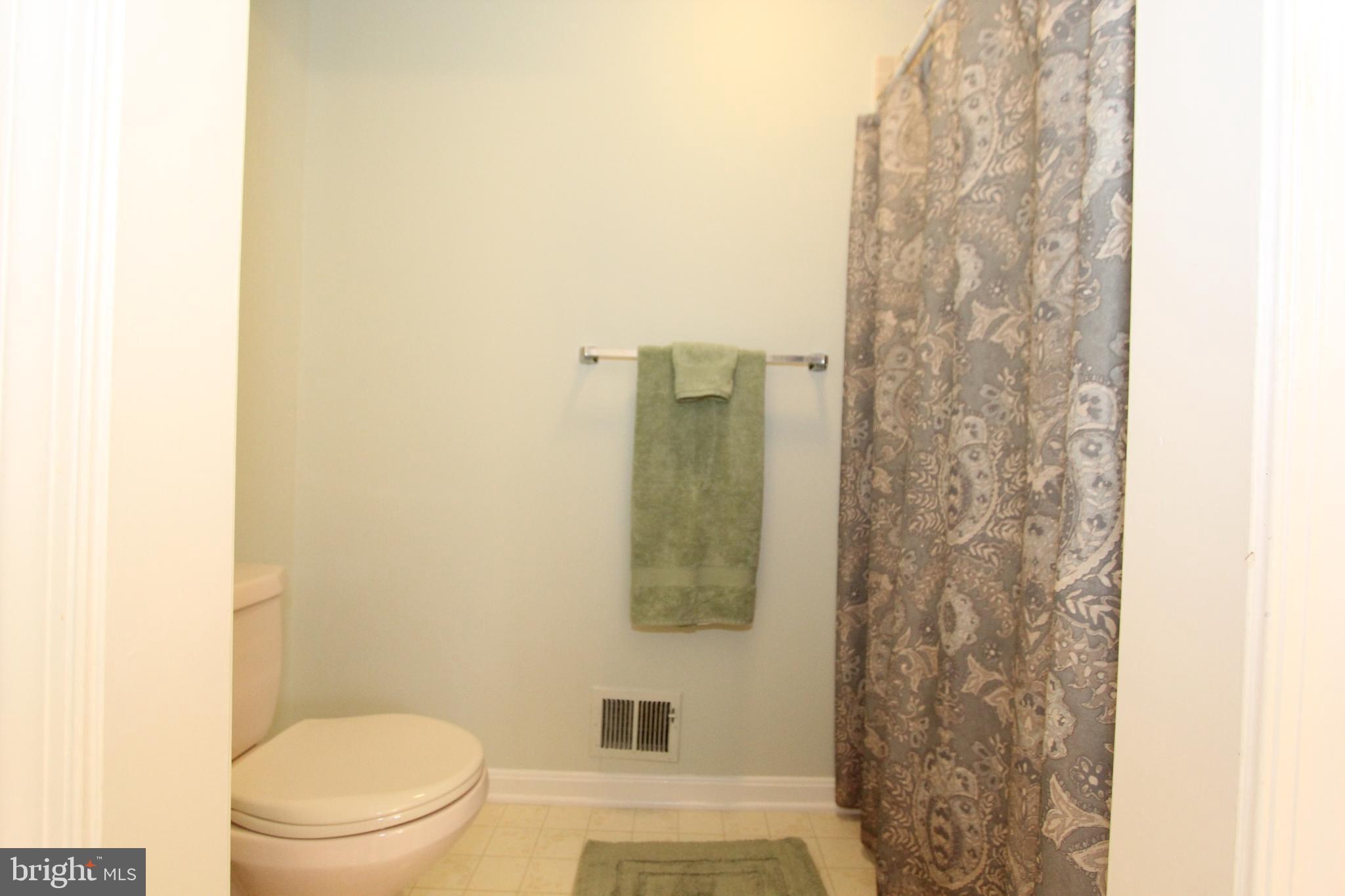 6670 Springhill Drive Frederick, MD 21702 - Photo 42 of 98 a bathroom with a toilet and a shower
