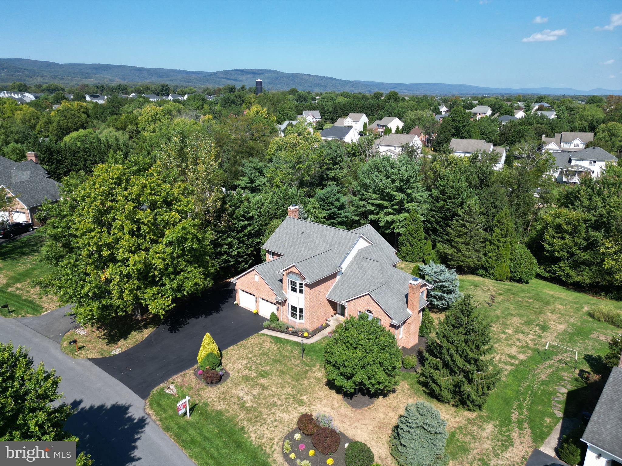 6670 Springhill Drive Frederick, MD 21702 - Photo 5 of 98 an aerial view of a house with a yard