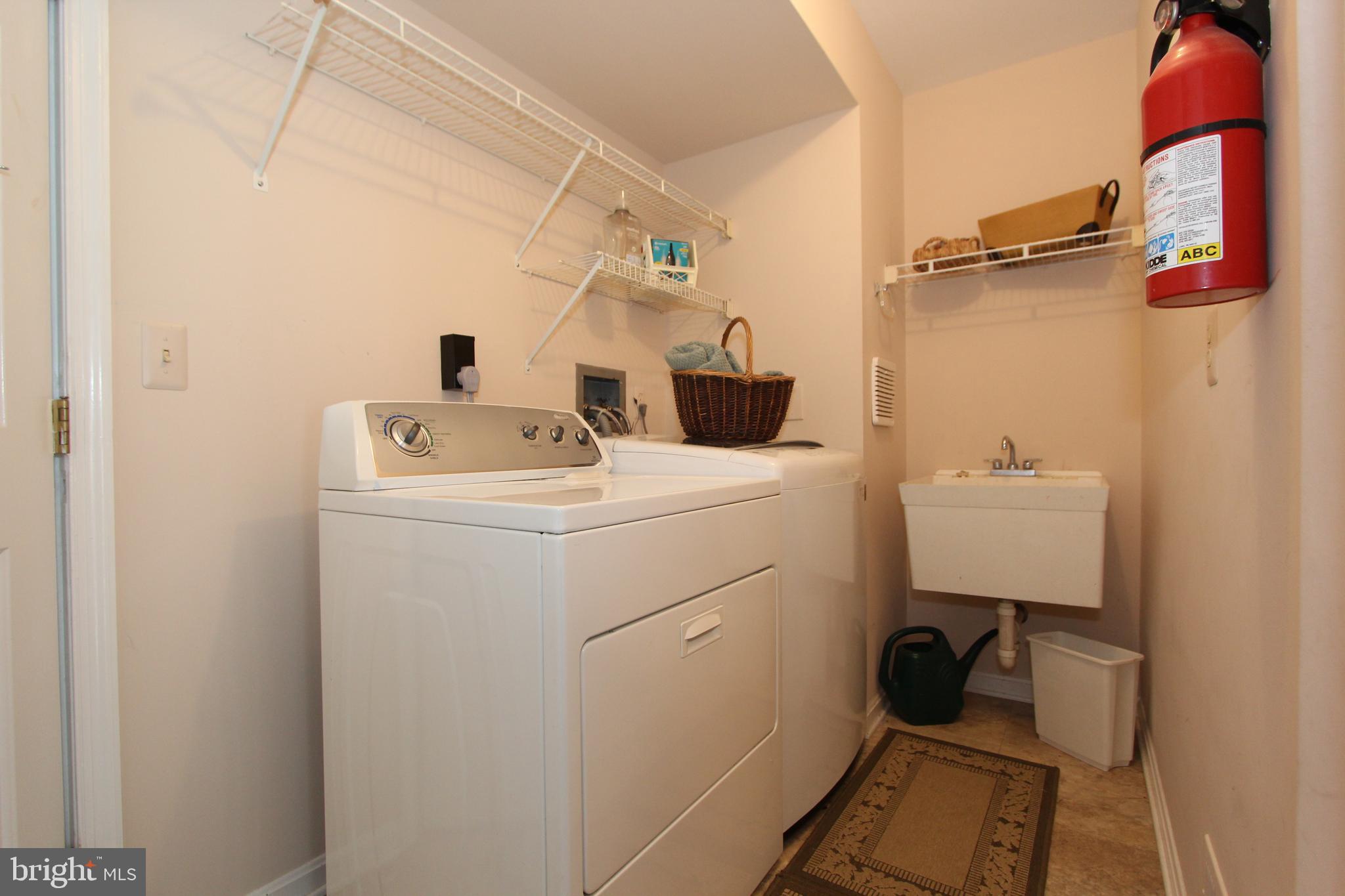 6670 Springhill Drive Frederick, MD 21702 - Photo 51 of 98 Main level laundry with utility sink & storage