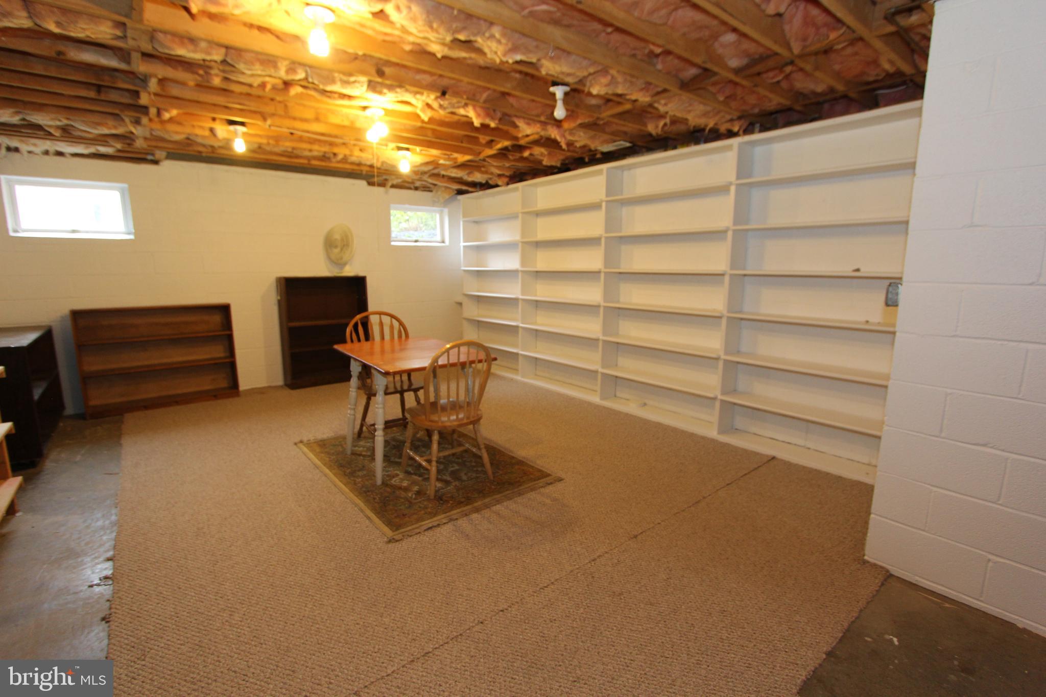 6670 Springhill Drive Frederick, MD 21702 - Photo 56 of 98 a view of a room with furniture and gym equipment