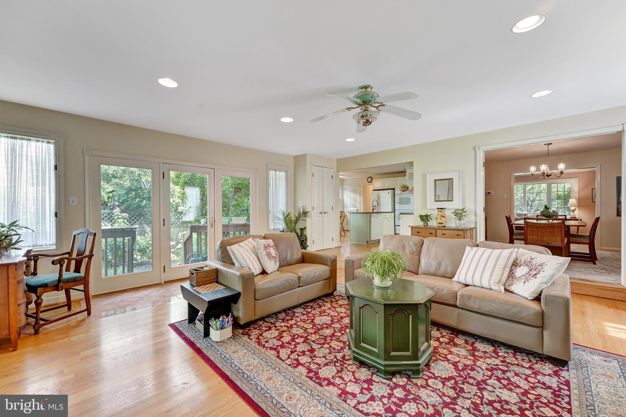 60 East Clearfield Road Havertown, PA 19083 - Photo 2 of 57 a living room with fireplace furniture and a rug