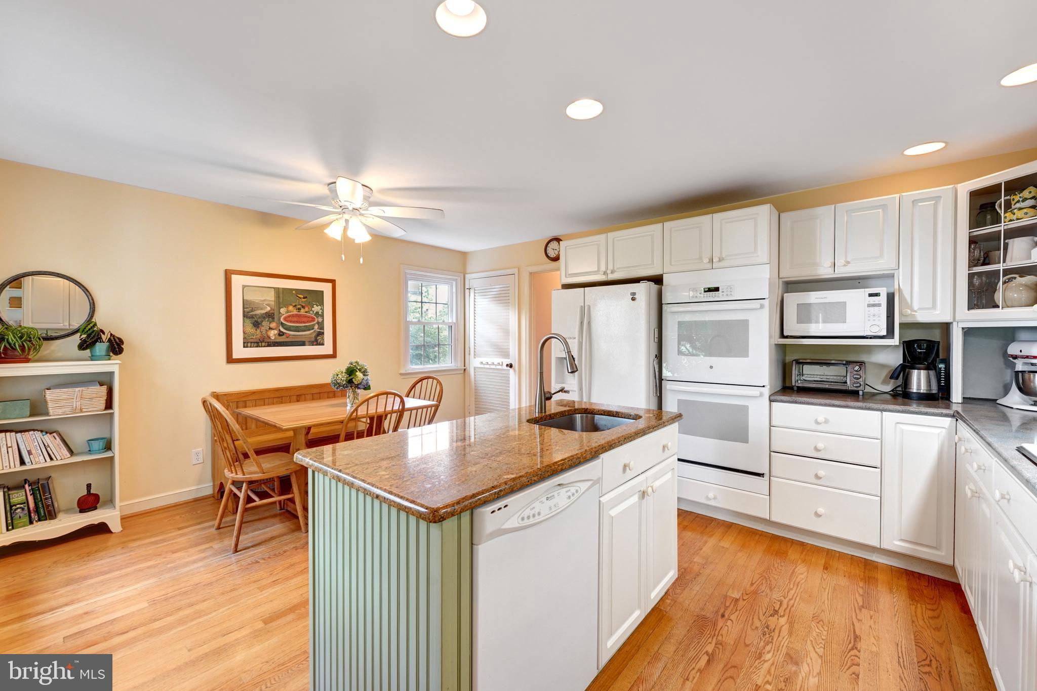 60 East Clearfield Road Havertown, PA 19083 - Photo 16 of 57 a kitchen with stainless steel appliances granite countertop a sink stove and refrigerator