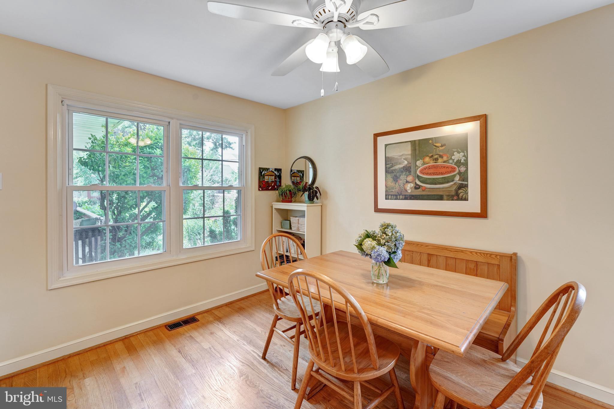 60 East Clearfield Road Havertown, PA 19083 - Photo 20 of 57 a view of a dining room with furniture window and wooden floor