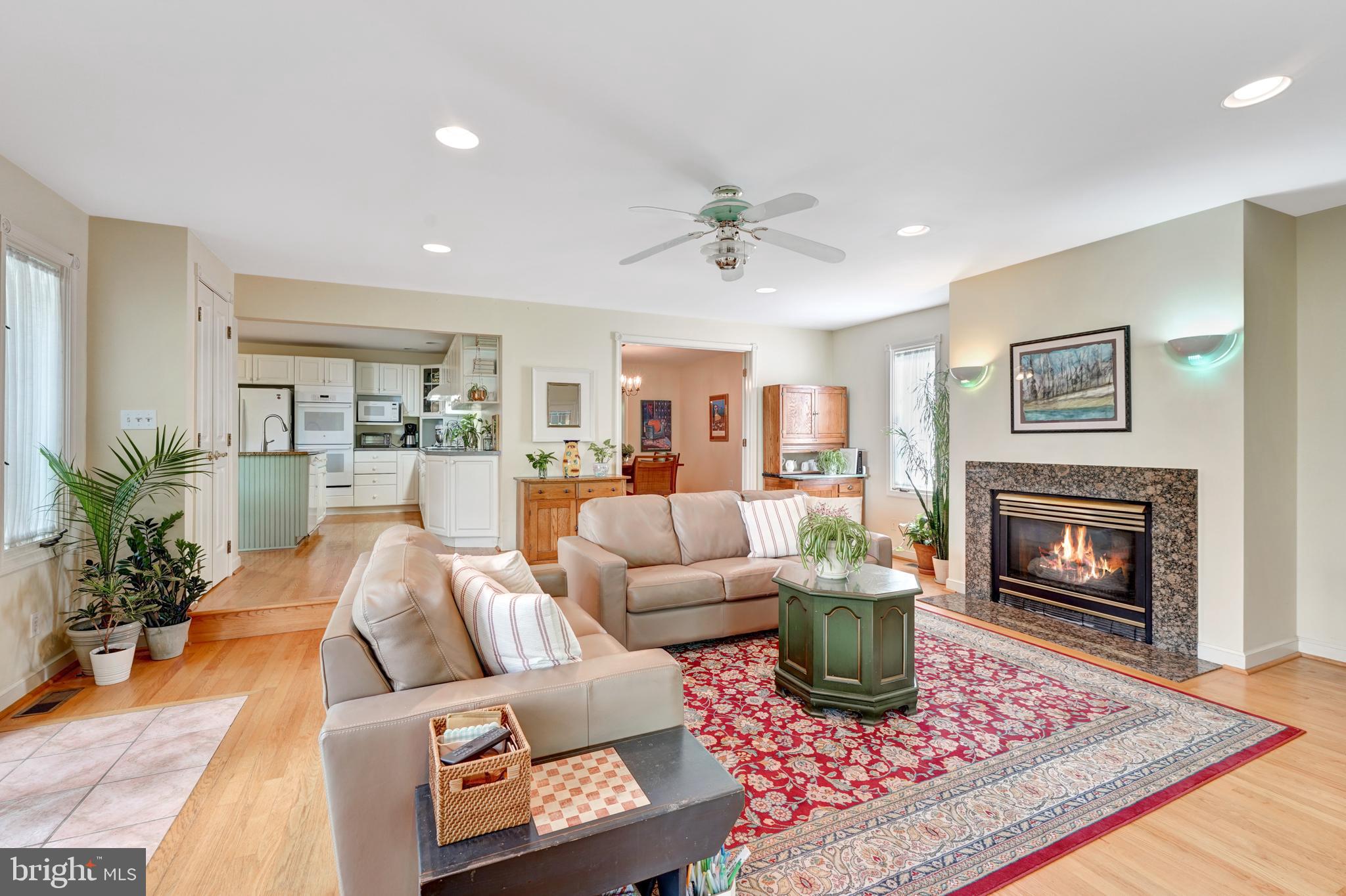 60 East Clearfield Road Havertown, PA 19083 - Photo 3 of 57 a living room with furniture a rug and a fireplace