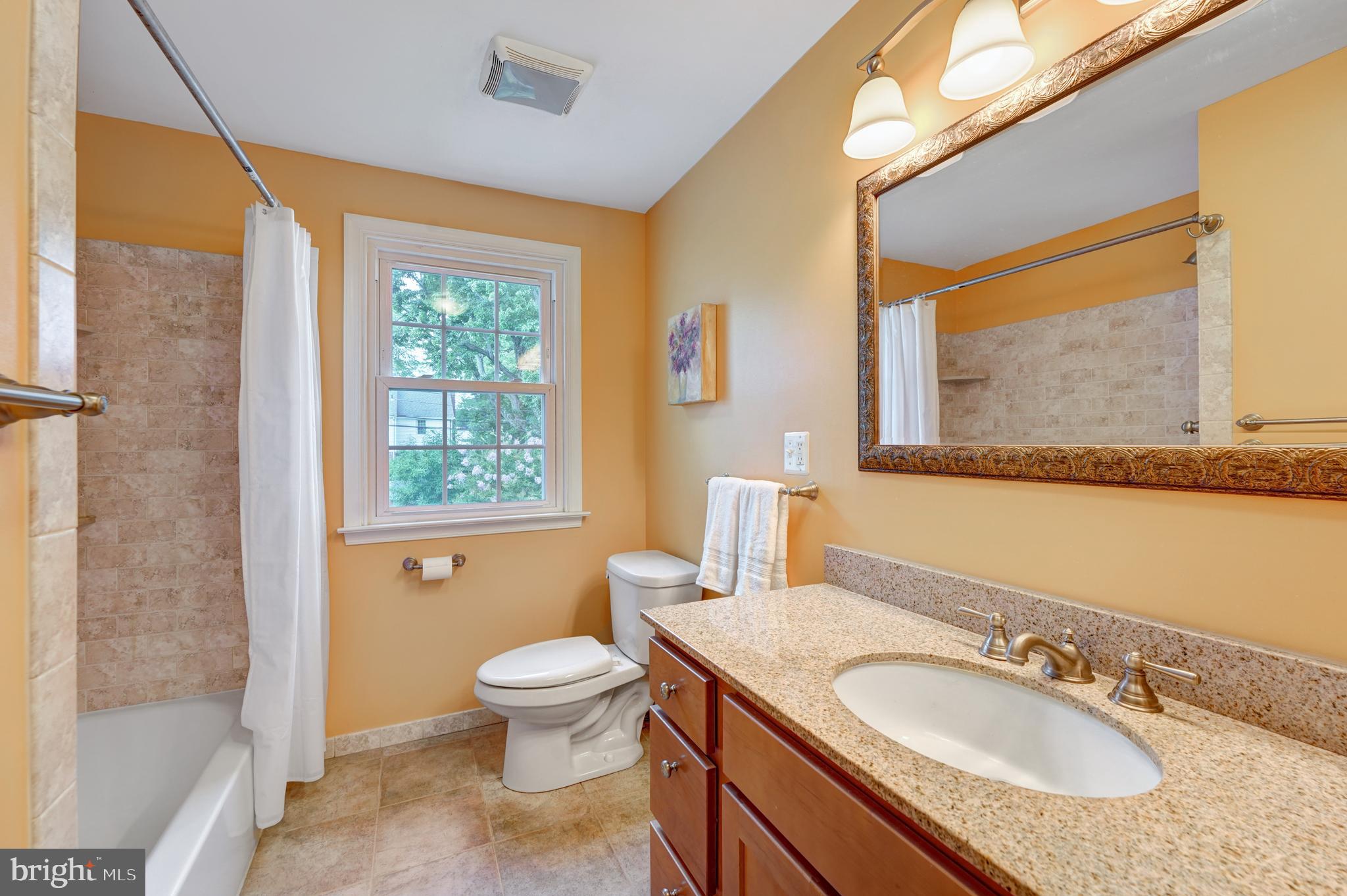 60 East Clearfield Road Havertown, PA 19083 - Photo 26 of 57 a bathroom with a granite countertop sink toilet and shower