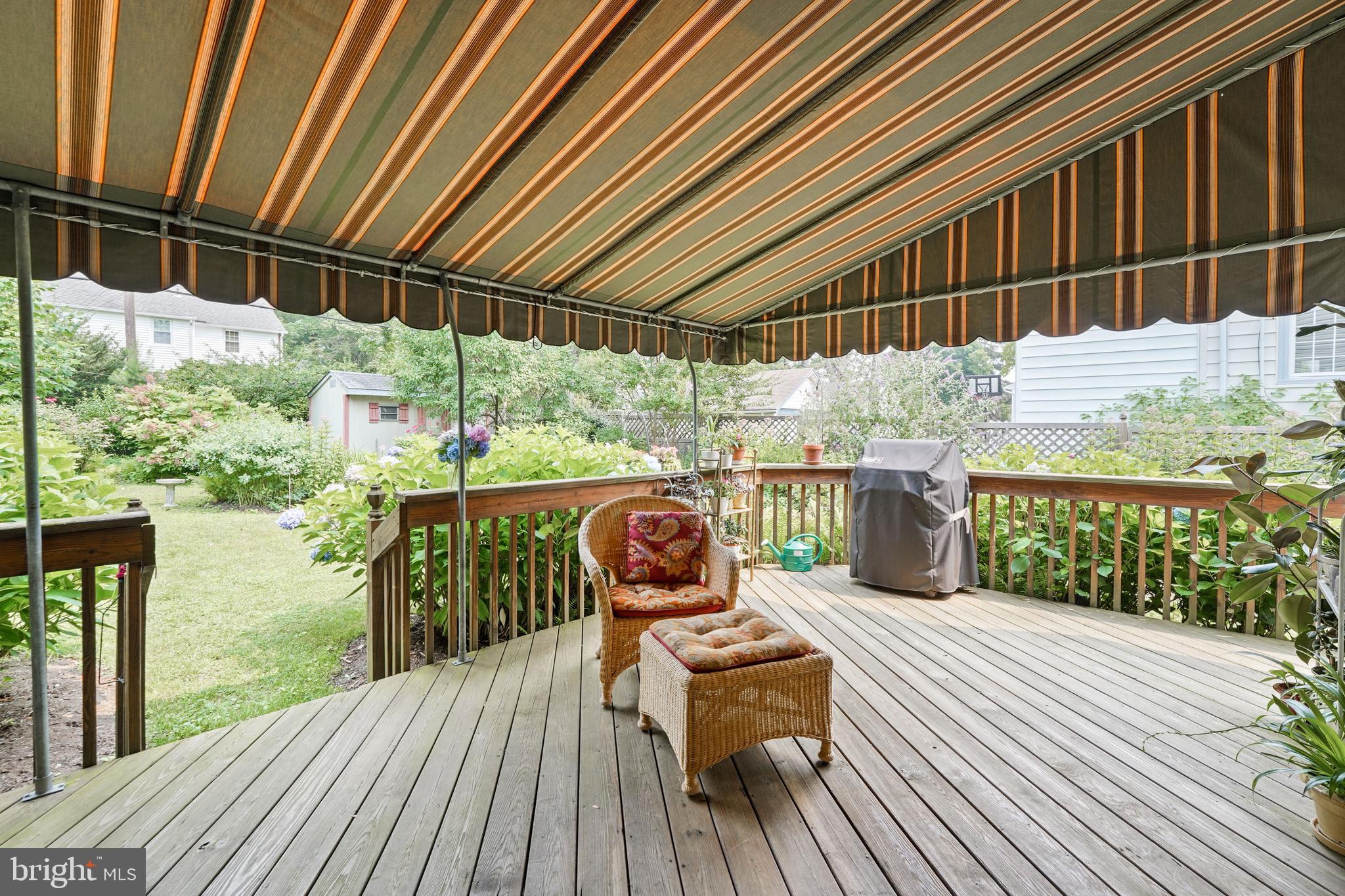 60 East Clearfield Road Havertown, PA 19083 - Photo 42 of 57 a view of a balcony with chairs and wooden floor