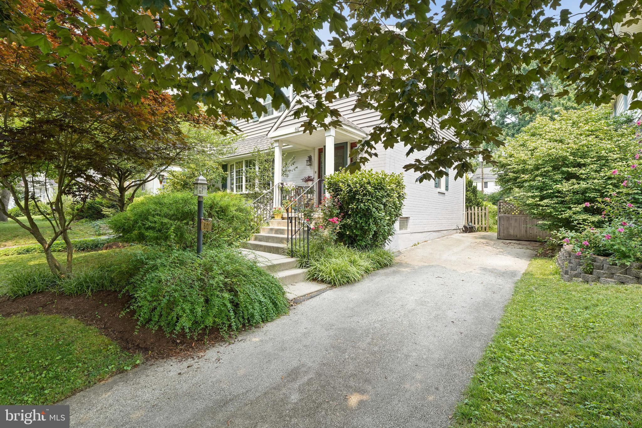 60 East Clearfield Road Havertown, PA 19083 - Photo 54 of 57 front view of a house with a yard