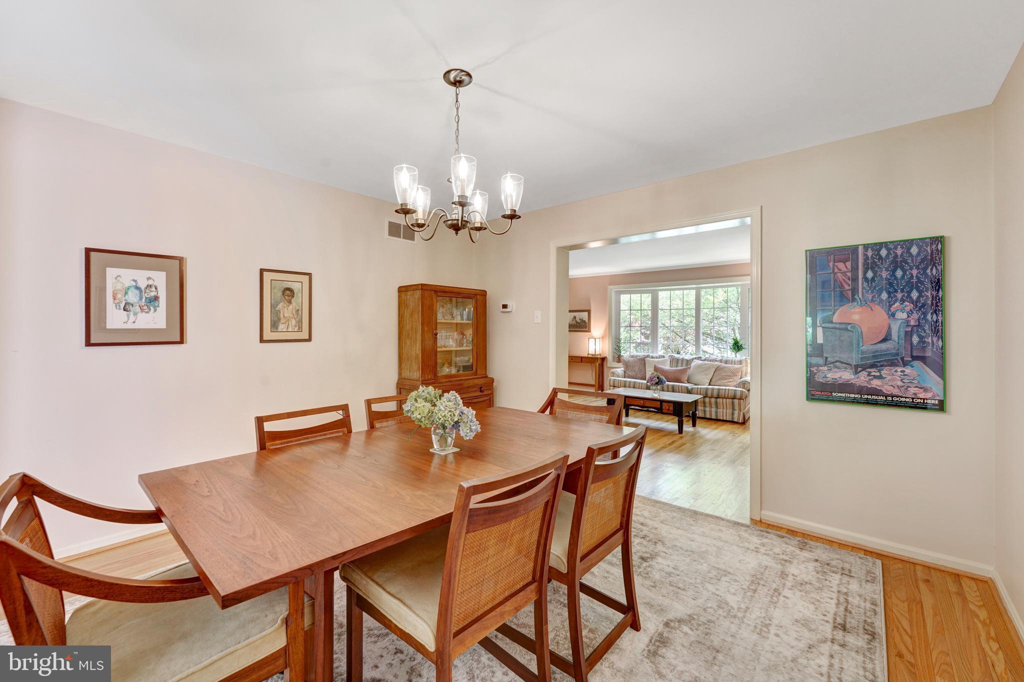 60 East Clearfield Road Havertown, PA 19083 - Photo 7 of 57 a view of a dining room with furniture and chandelier