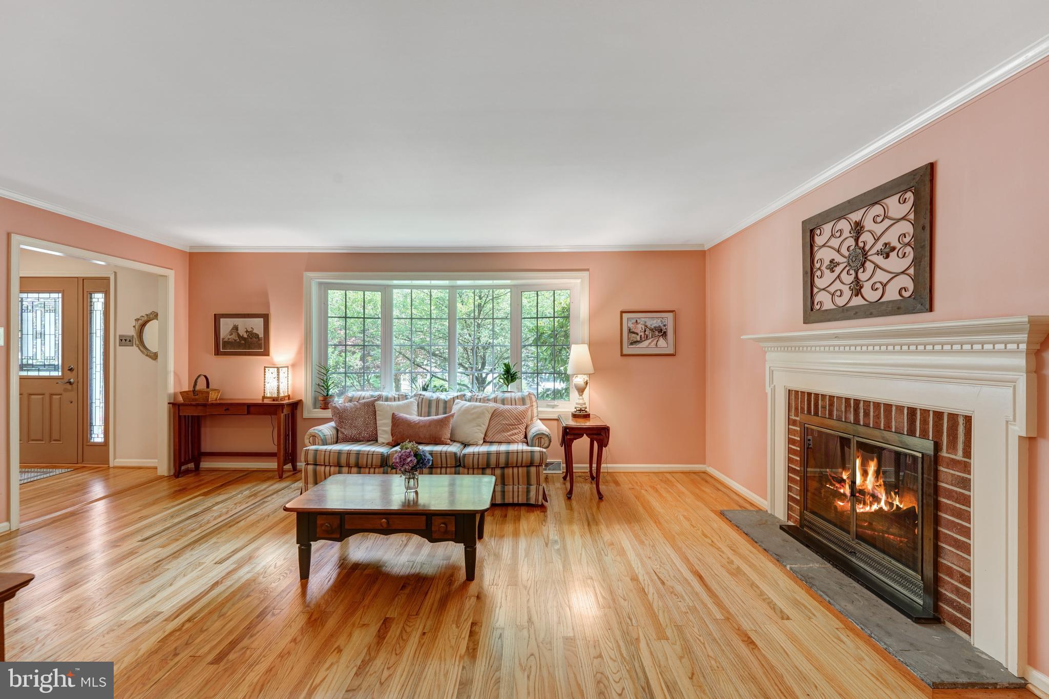 60 East Clearfield Road Havertown, PA 19083 - Photo 8 of 57 a living room with furniture and a fireplace