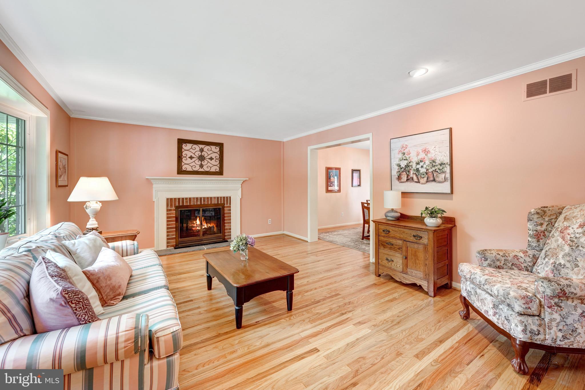 60 East Clearfield Road Havertown, PA 19083 - Photo 10 of 57 a living room with furniture and a fireplace