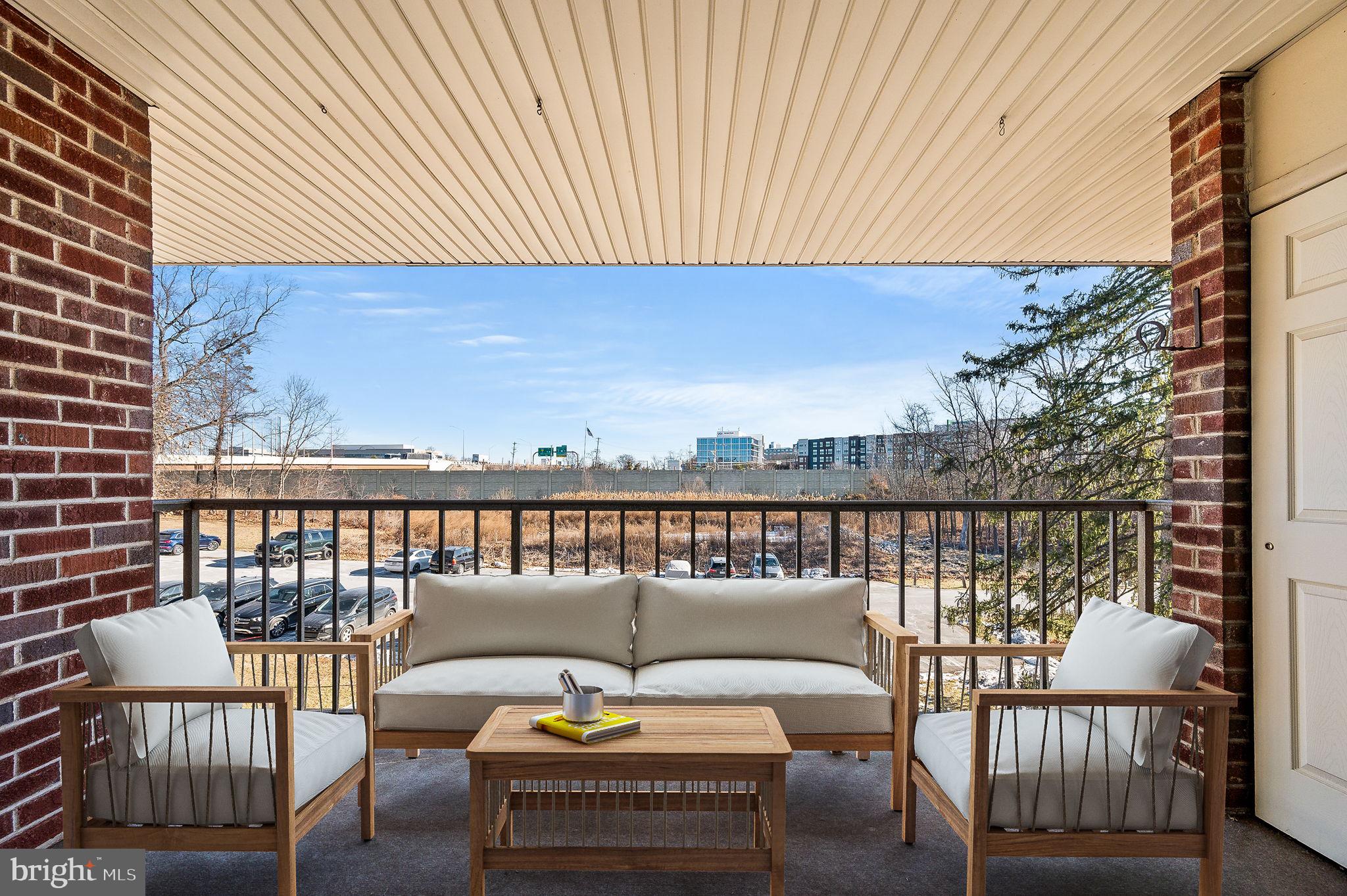 401 Drummers Lane Wayne, PA 19087 - Photo 18 of 21 a view of a balcony with wooden floor