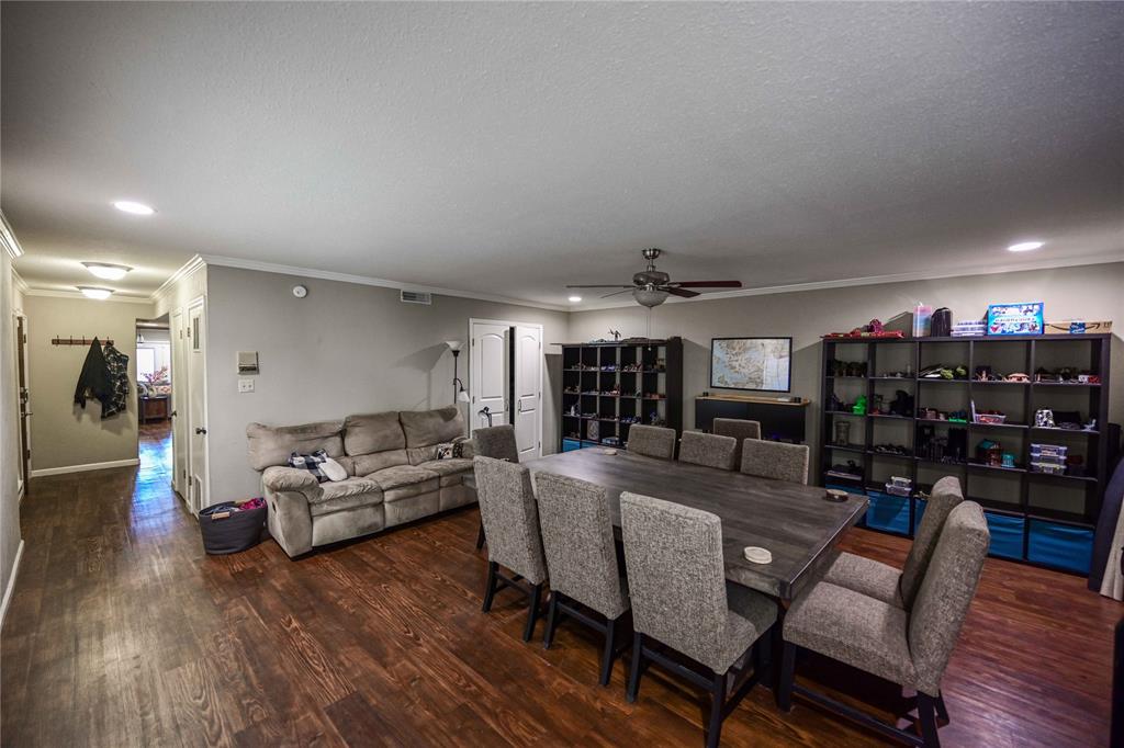 32 Rue Maison Abilene, TX 79605 - Photo 19 of 40 a living room with furniture and wooden floor