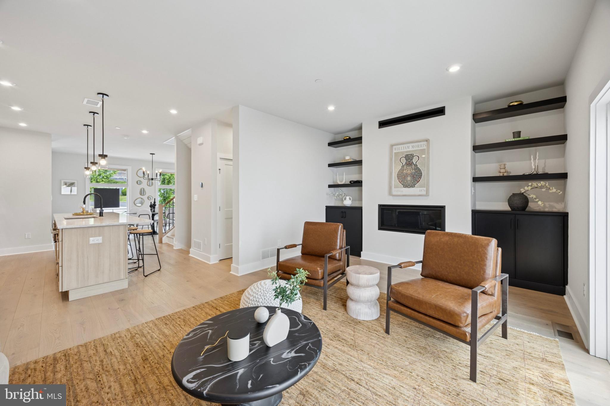 226 North Main Street Doylestown, PA 18901 - Photo 2 of 24 a living room with furniture and a fireplace