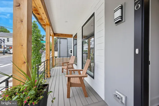a view of balcony with furniture