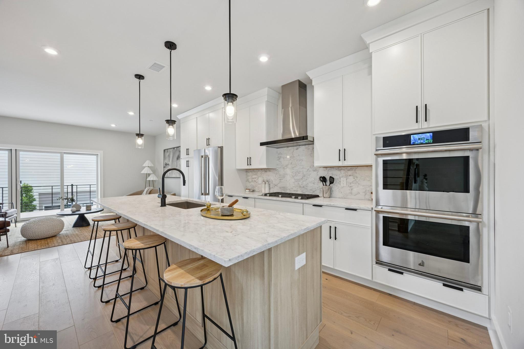 226 North Main Street Doylestown, PA 18901 - Photo 6 of 24 a kitchen with a stove a sink and a refrigerator