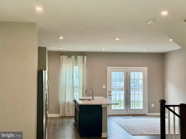 a large white room with a large window