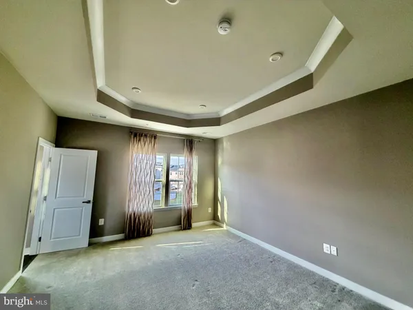 a view of a livingroom with a staircase