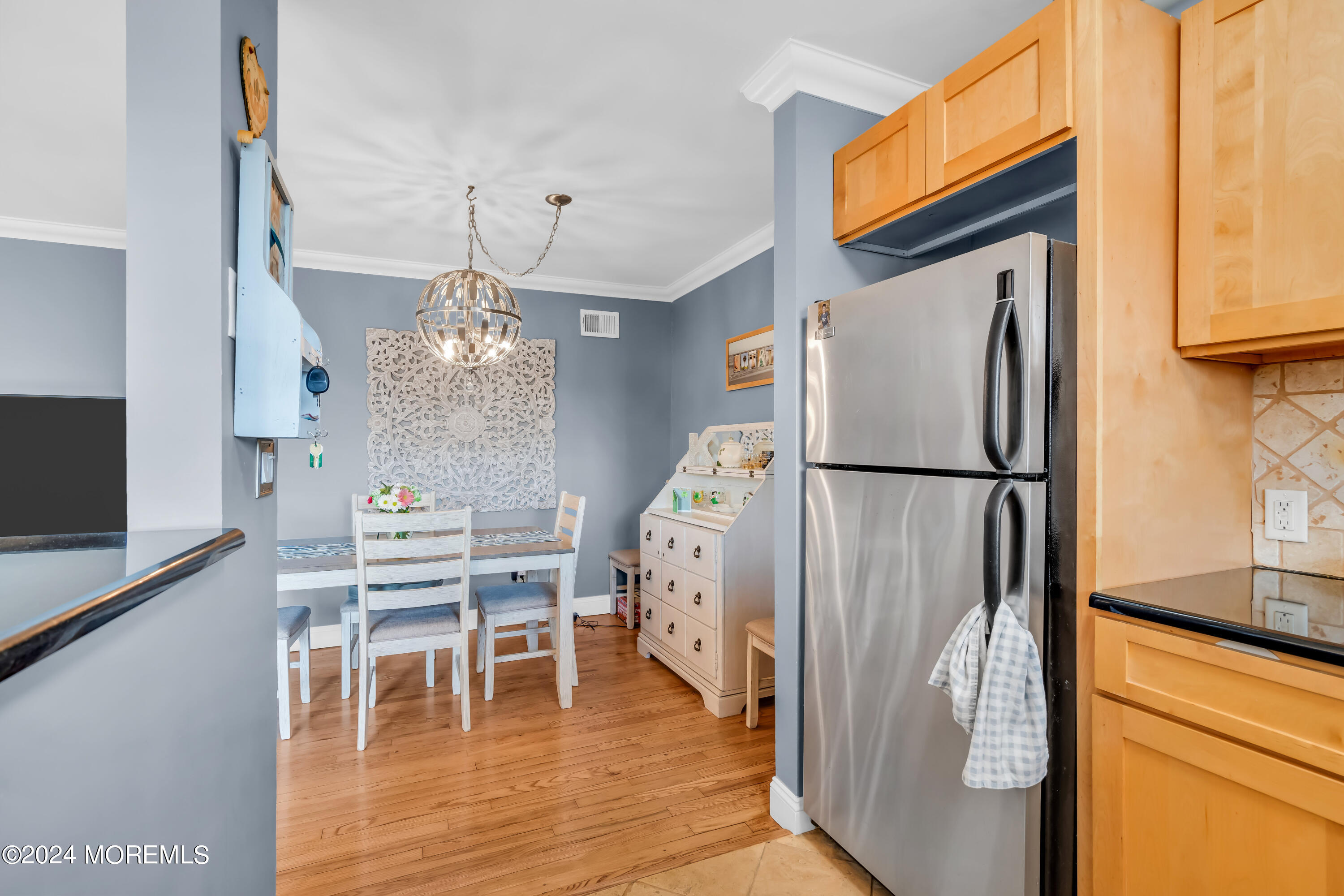 1641 Elm Avenue, Unit 18 Point Pleasant, NJ 08742 - Photo 12 of 23 a view of kitchen with furniture and wooden floor