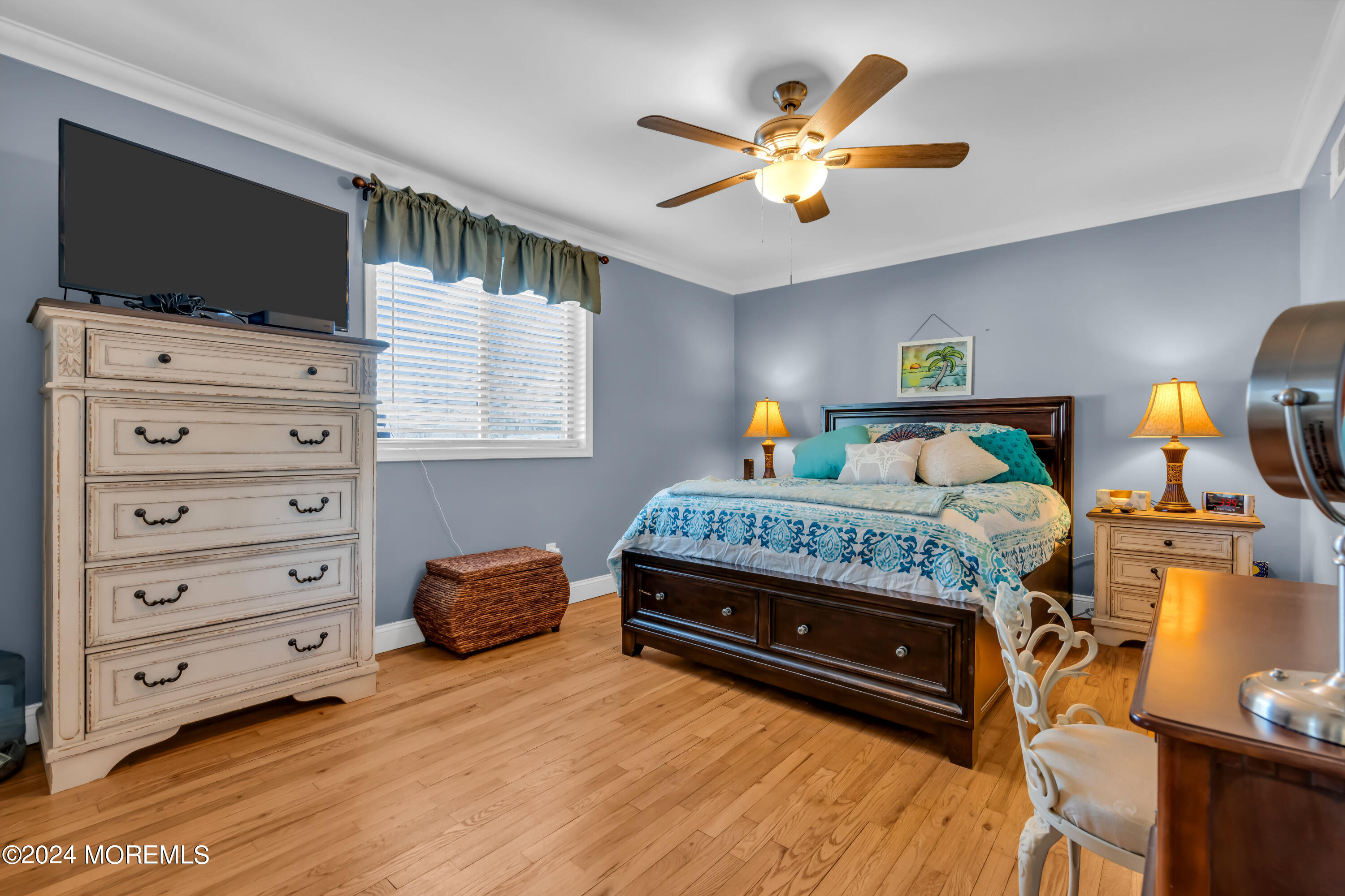 1641 Elm Avenue, Unit 18 Point Pleasant, NJ 08742 - Photo 15 of 23 a bedroom with a bed and flat screen tv