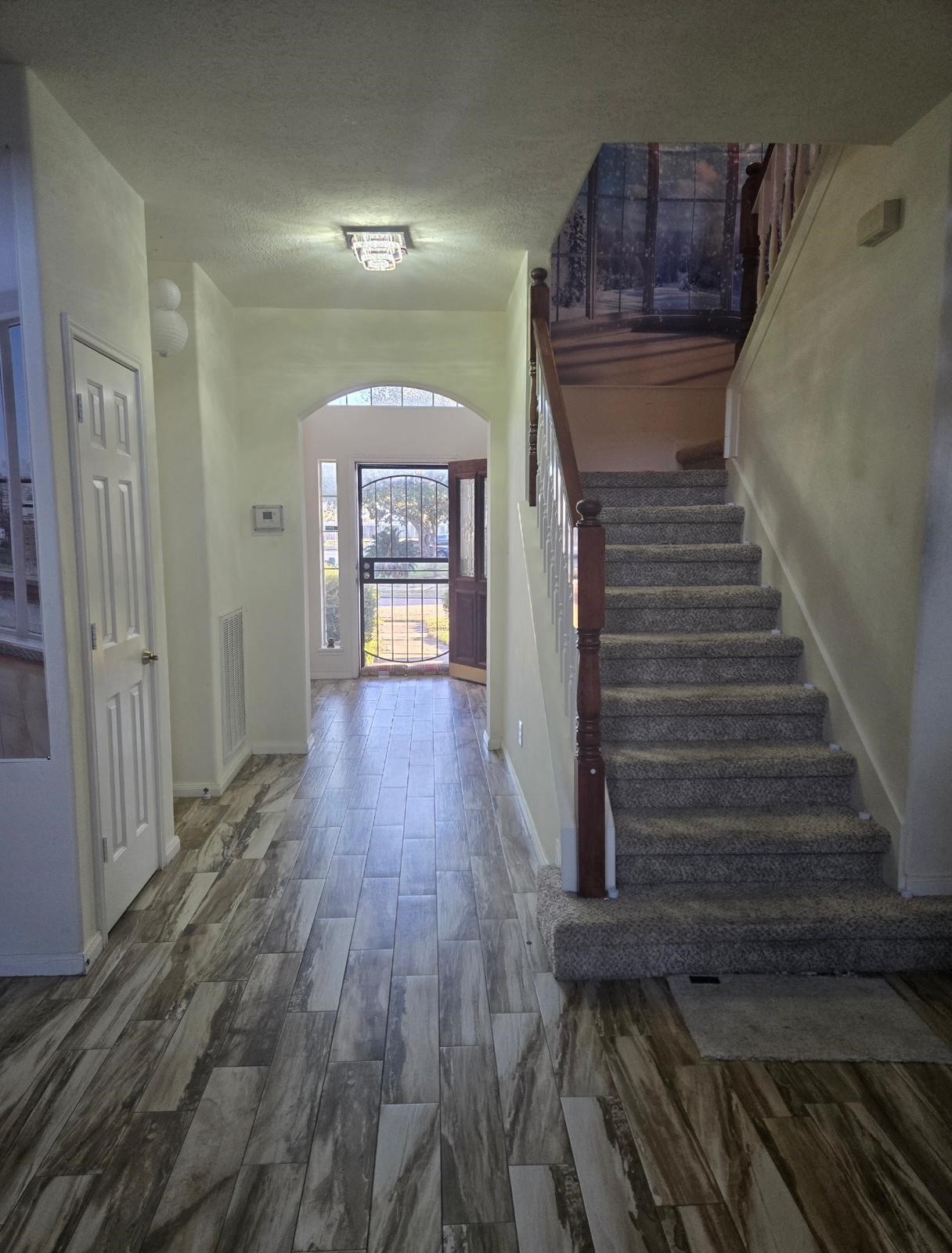 Welcoming front yard with a well-maintained lawn and a charming exterior, offering great curb appeal in the Eldridge View subdivision.
