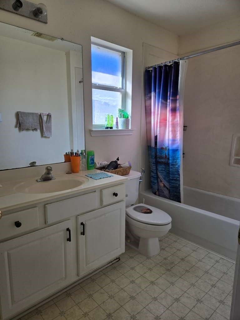 13906 Winter Rose Way Houston, TX 77083 - Photo 22 of 29 Primary bathroom with practical layout, featuring essential fixtures and storage for everyday convenience.