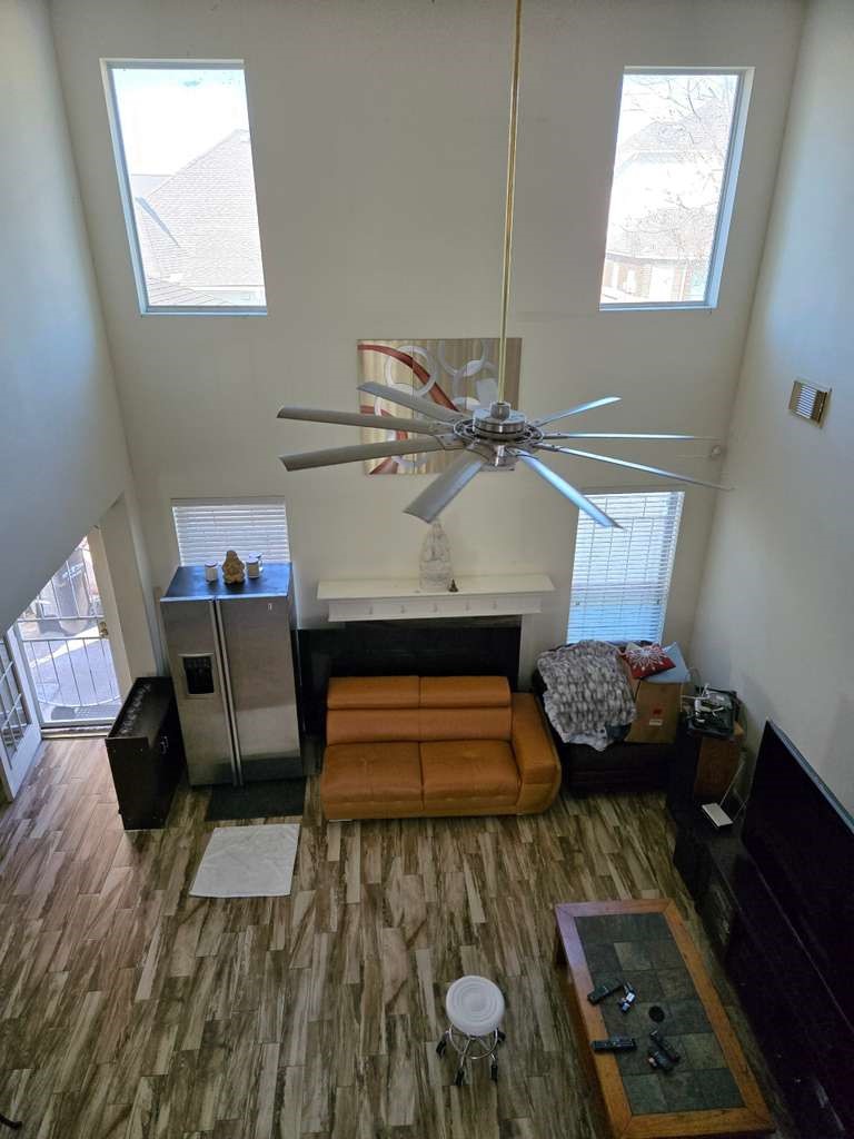 13906 Winter Rose Way Houston, TX 77083 - Photo 7 of 29 Spacious living area with an open layout, providing a comfortable space for relaxing or entertaining guests.