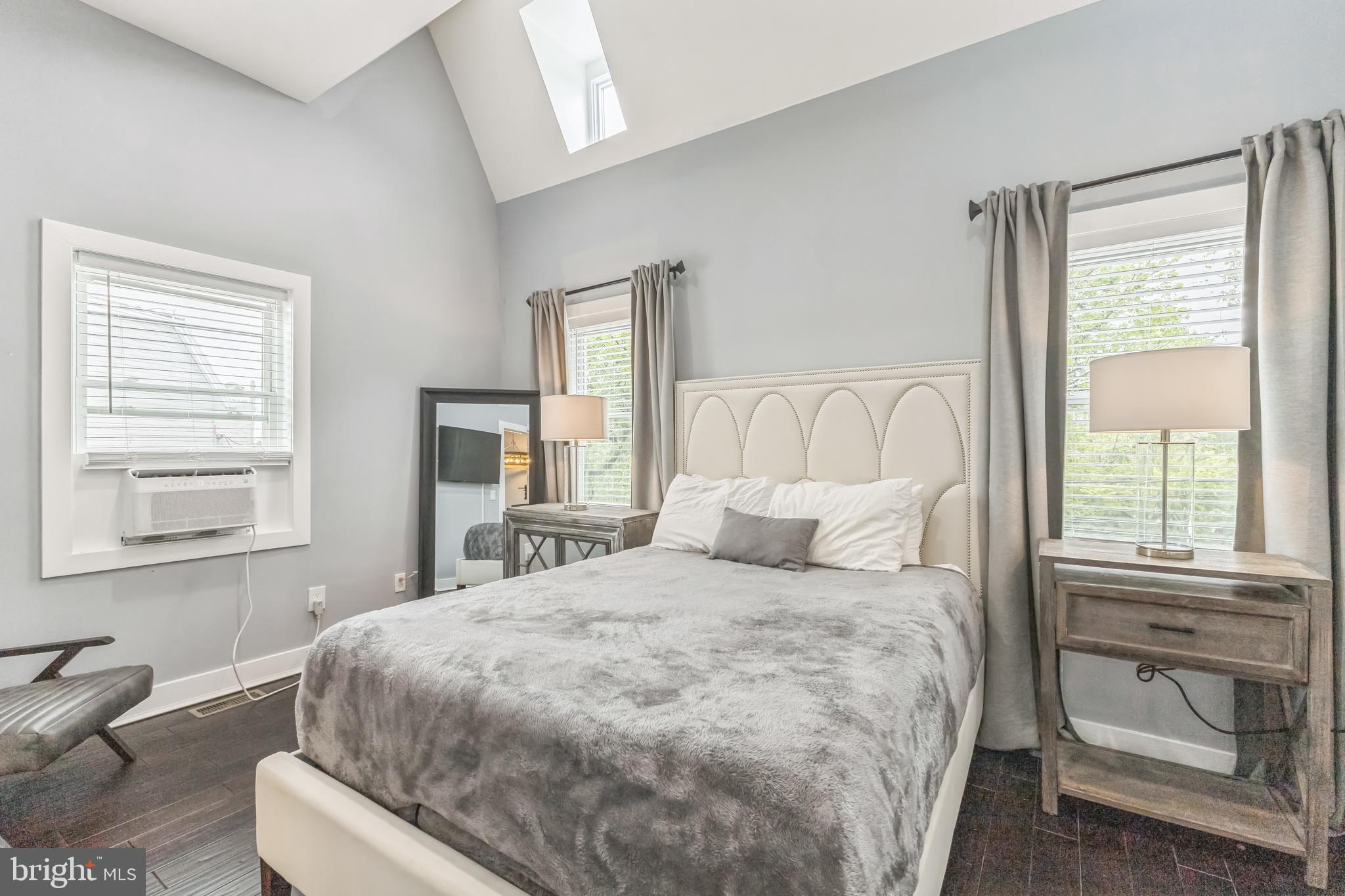 5623 Kansas Avenue Northwest Washington, DC 20011 - Photo 17 of 32 a bedroom with a bed and a window