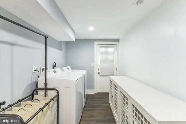 a storage room with a washer and dryer