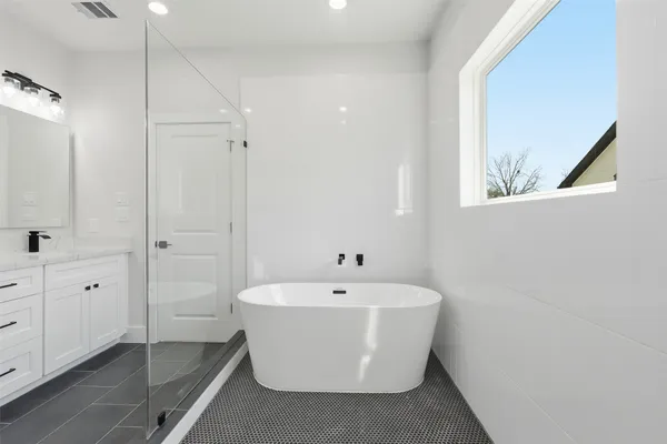 a white room with wooden floor