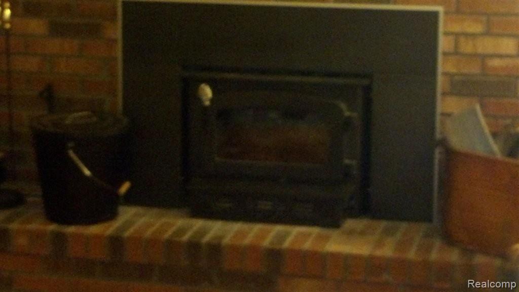 4475 Fenton Road Hartland, MI 48353 - Photo 10 of 12 Fireplace