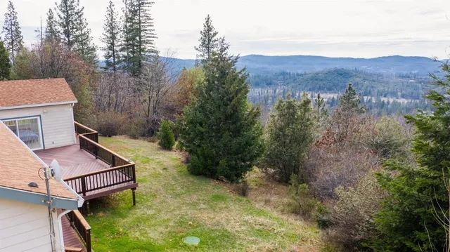 a view of a chairs in front of a house
