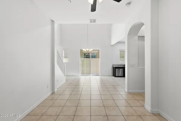 a view of a hallway with front door