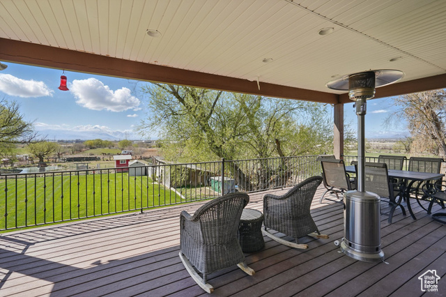 2490 South State Street Springville, UT 84663 - Photo 20 of 38 Deck with outdoor dining space and a yard
