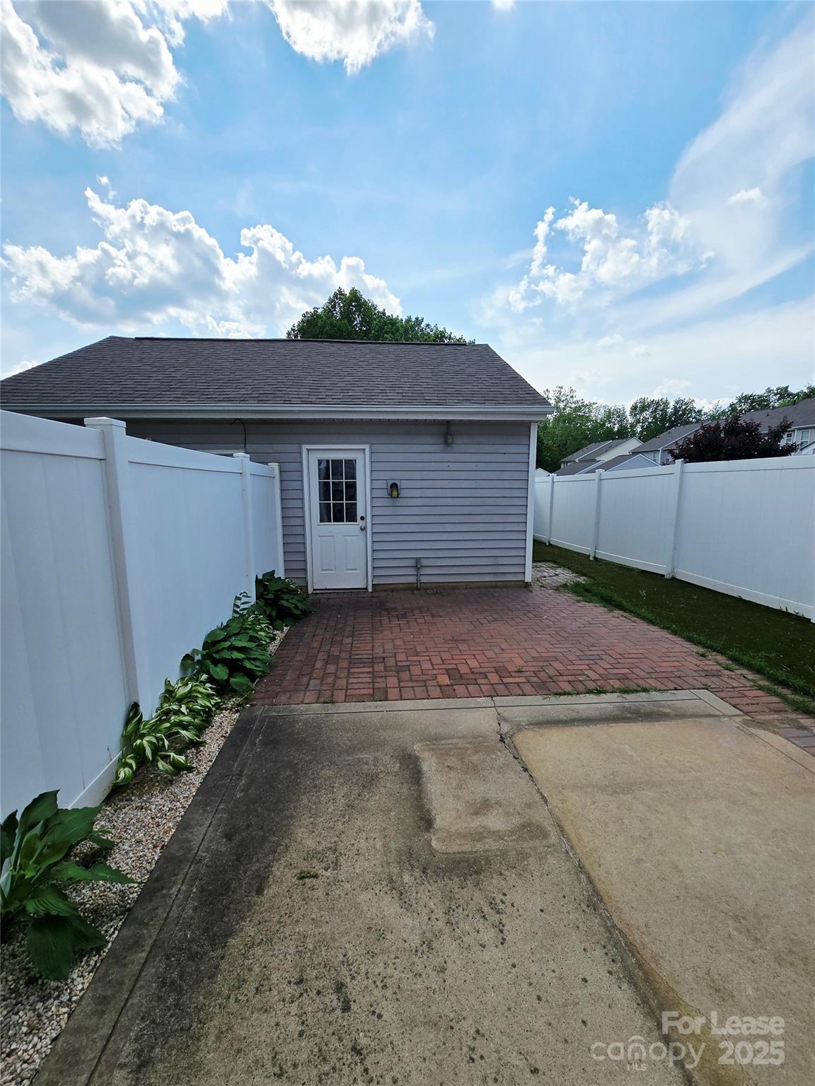 19025 Coachmans Trace Cornelius, NC 28031 - Photo 30 of 34 a view of a house with a yard