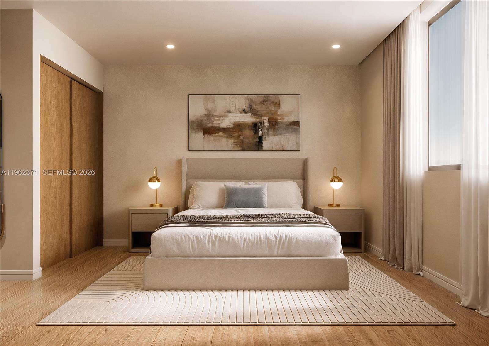 a bedroom with a large bed and a window