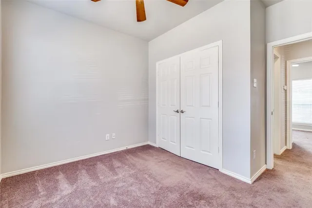 a kitchen with stainless steel appliances granite countertop a sink stove and microwave