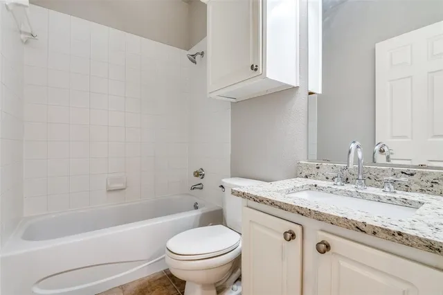 an empty room with a empty space and mirror