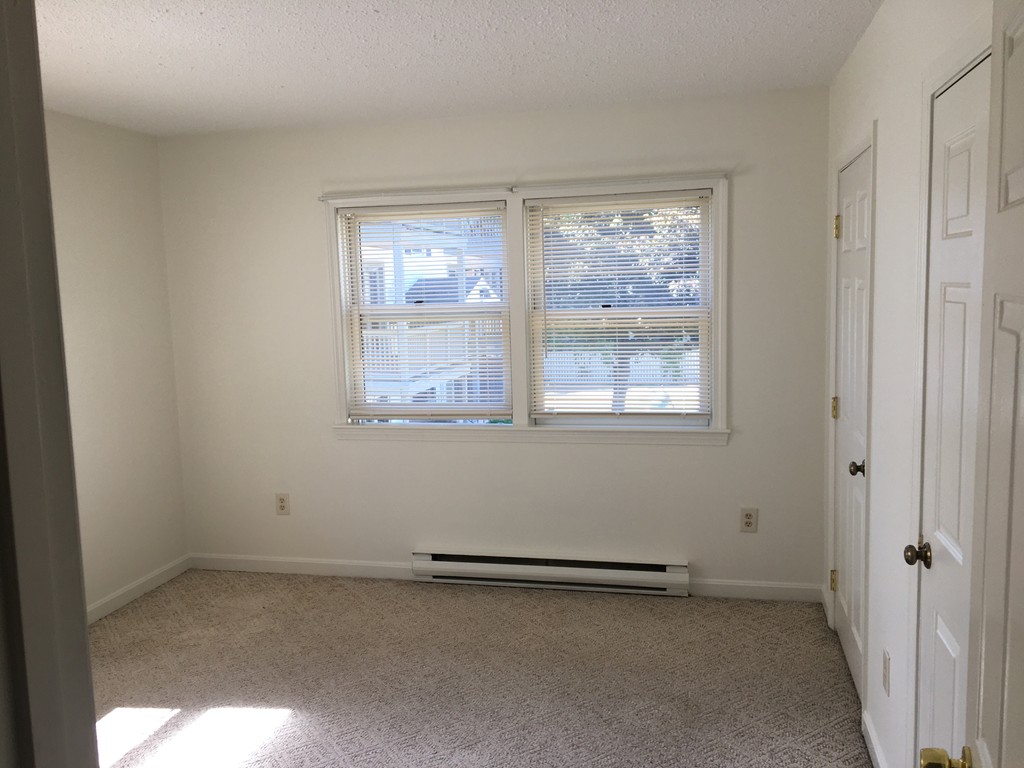 30 Abbey Road, Unit 202 Leominster, MA 01453 - Photo 8 of 10 an empty room with a window